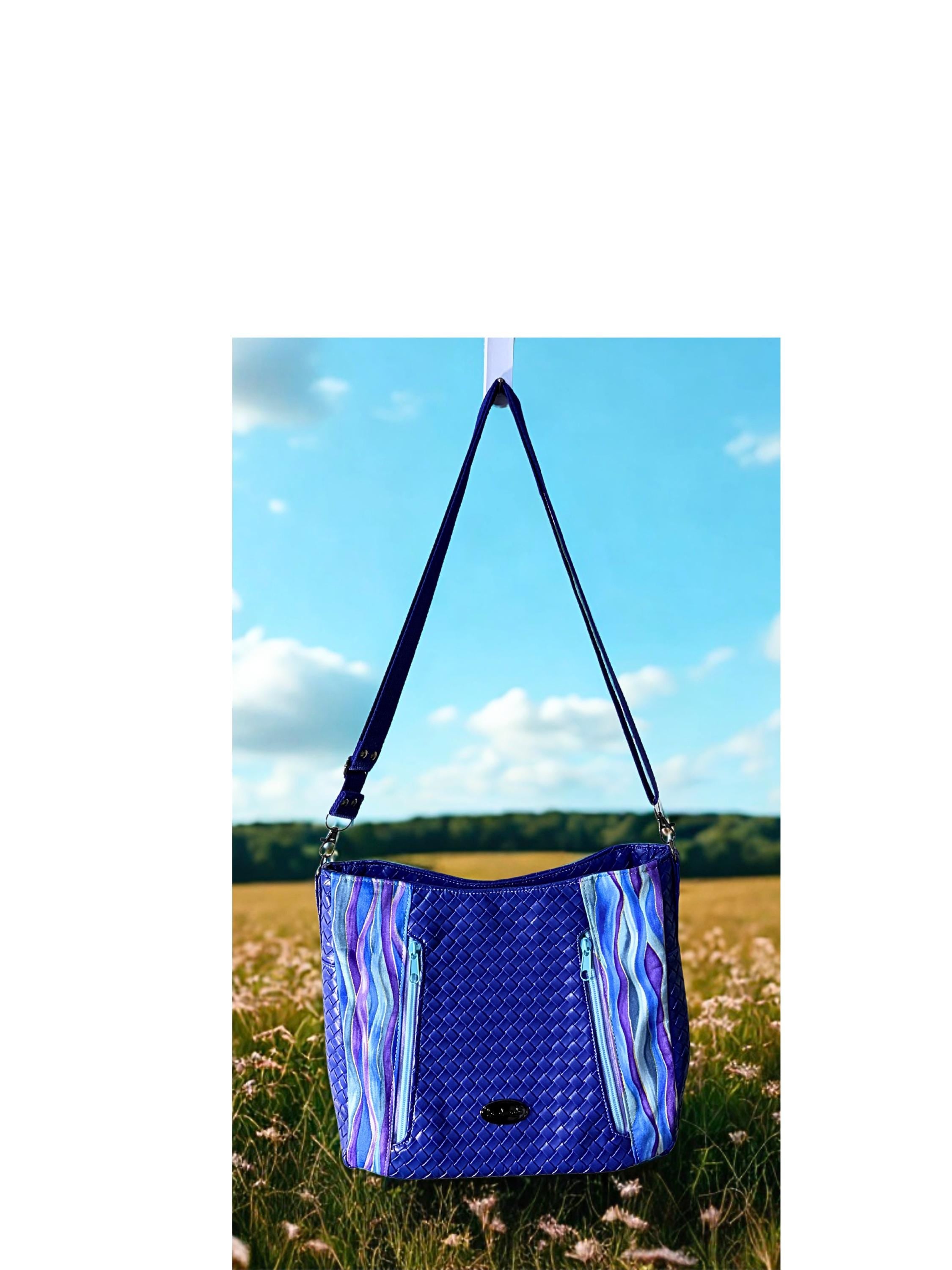 Blue Crossbody Bag with Zipper Pockets and Purple Bow Pull