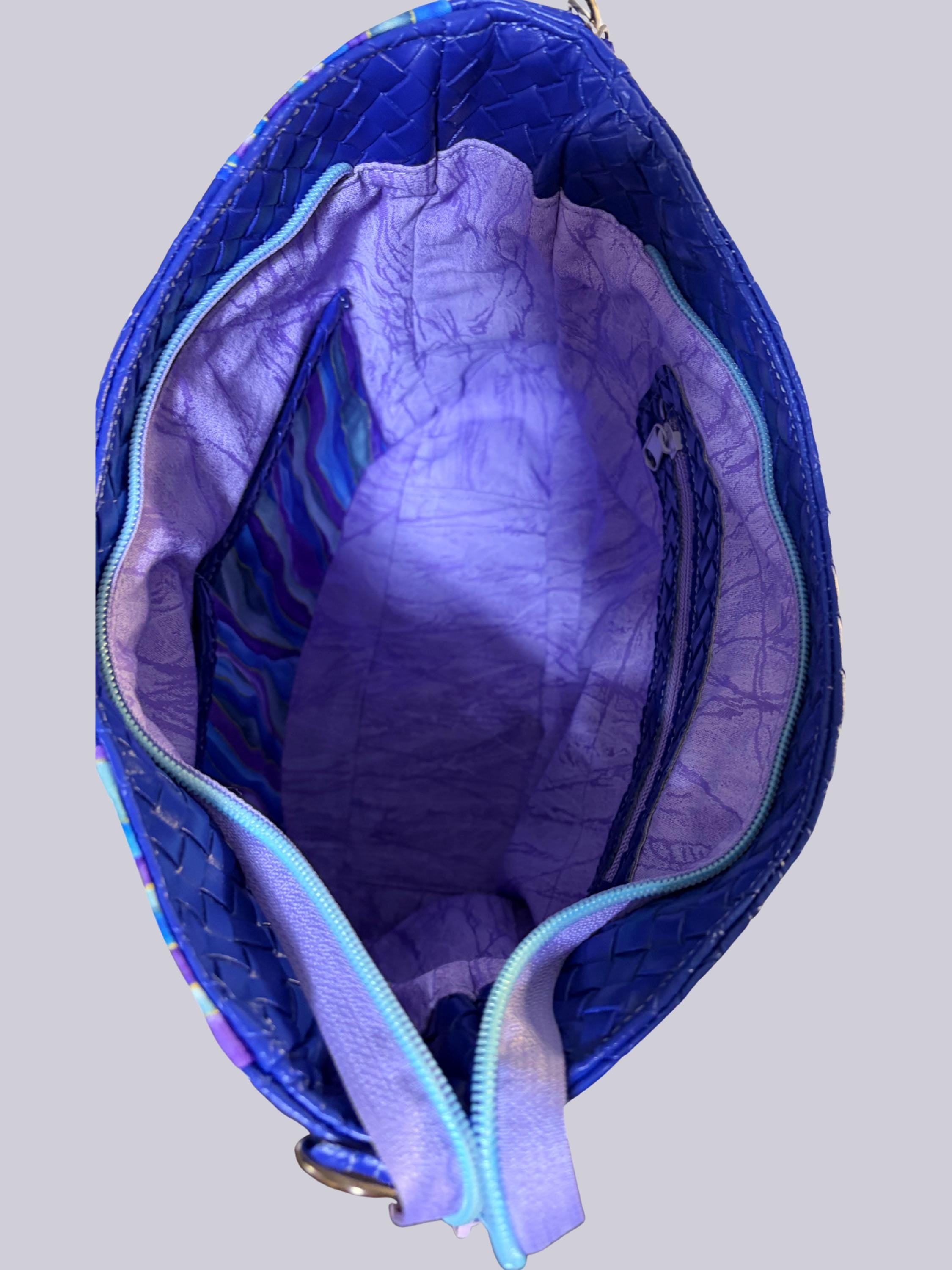Blue Crossbody Bag with Zipper Pockets and Purple Bow Pull